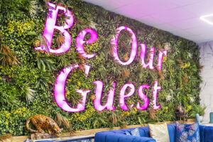 Be Our guest Sign at keyless entry Hotel Holloway